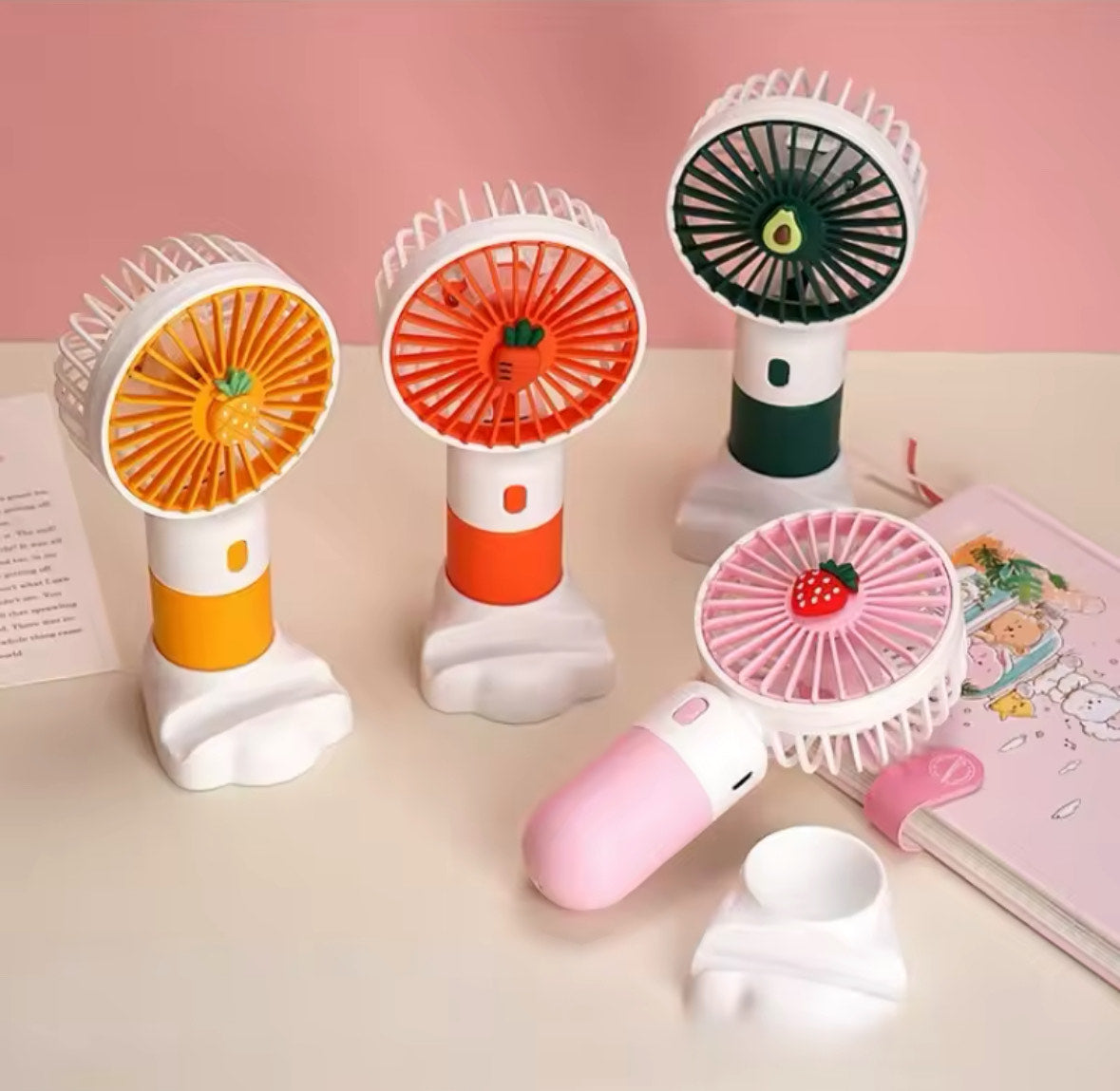 pink handheld fan with USB charging – lashes and nails